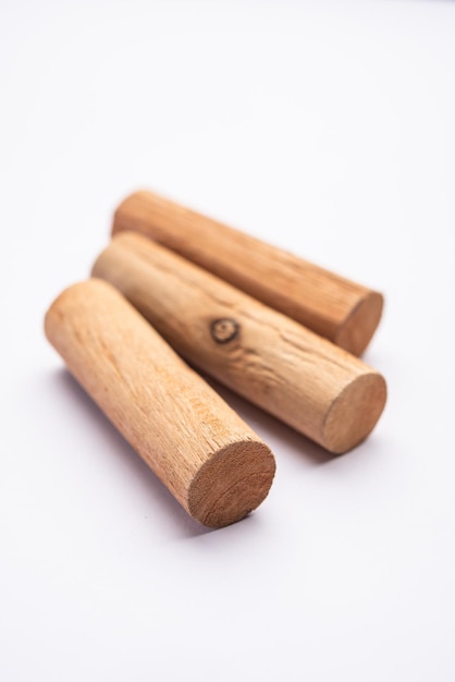 Chandan or sandalwood powder with sticks perfume or oil which retain their fragrance for decades