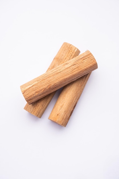 Chandan or sandalwood powder with sticks, perfume or oil which retain their fragrance for decades