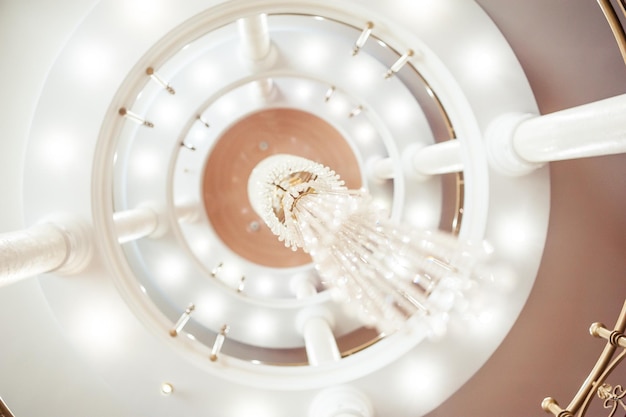 A chandelier in a house with the word chandelier on it