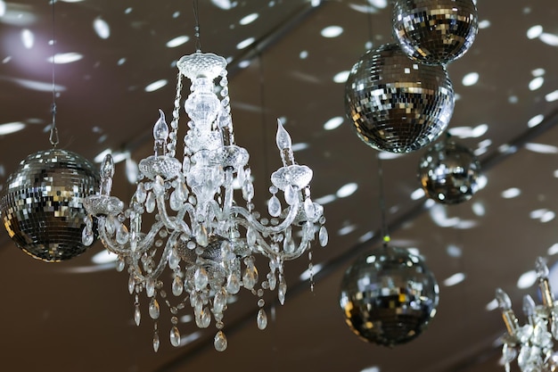 Chandelier in wedding decor gala dinner corporate formal event\
banquet