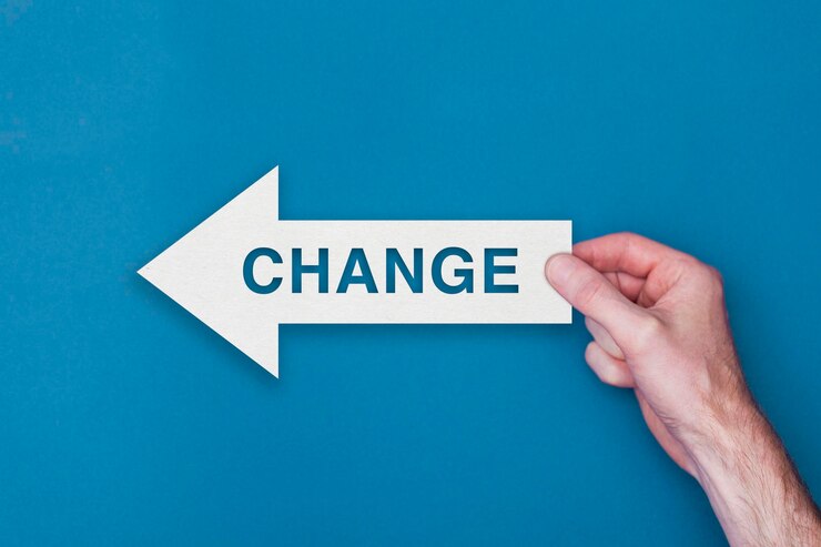 Photo change arrow direction held on a blue background