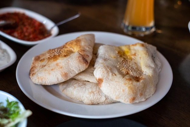 Chapati flatbread with sesame of indian food on the table