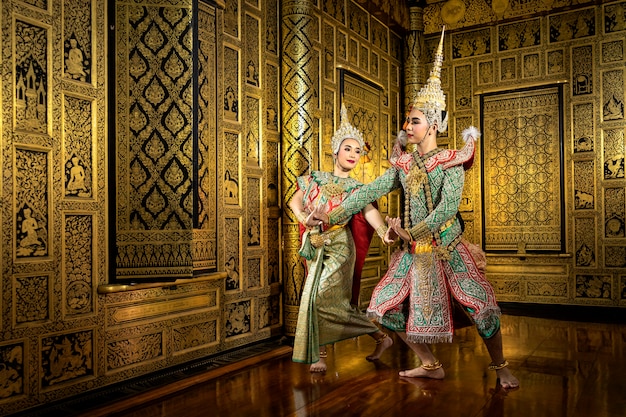 The character Phra and Nang dancing in a Thai pantomime performance.