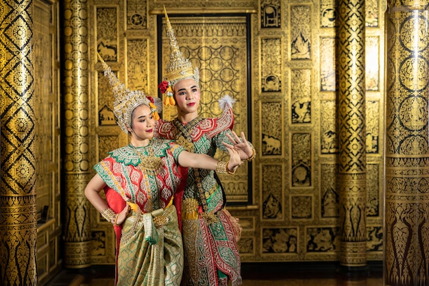 The character Phra and Nang dancing in a Thai pantomime performance.