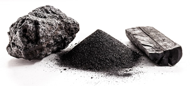 Charcoal, coal dust and mineral coal on isolated white background.