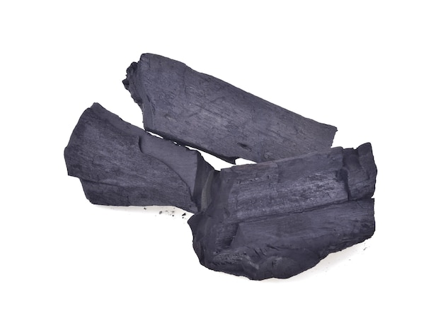 Charcoal. Pile of natural wood charcoal, traditional charcoal or hardwood charcoal, isolated