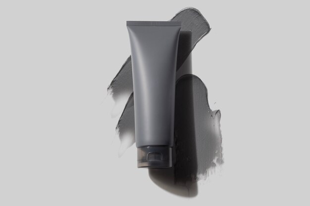 Фото Уголь для ухода за кожей мужчины косметический лосьон крем скраб для медицинского лечения лица макет брендинга продукта