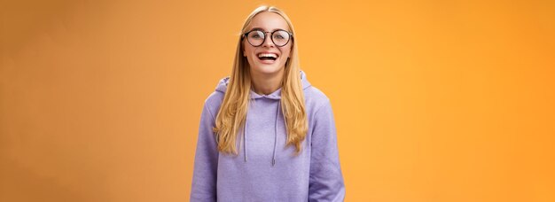 Charismatic joyful charming smiling female university straight a student in glasses purple cozy