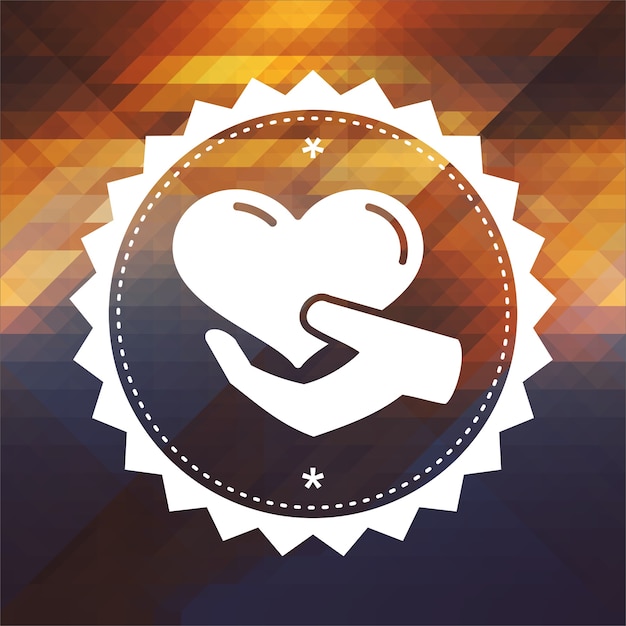 Photo charity concept - icon of heart in the hand. retro label design. hipster background made of triangles, color flow effect.