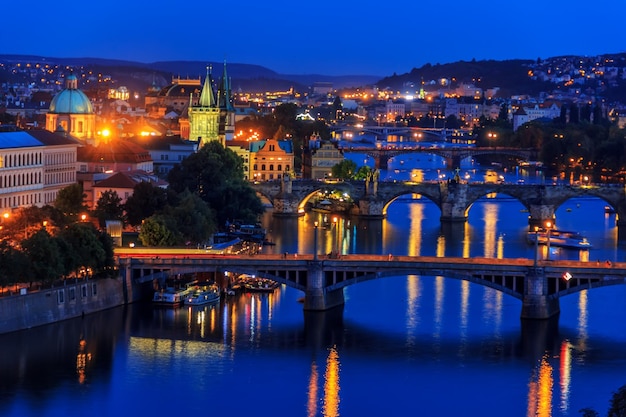 Charles Bridge and other Prague bridges over the Vltava night v