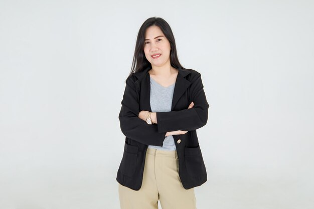 Charming business professional lady standing with confidence on smart jacket and attractively smile with folded arms on successful manager of outfit fashion.