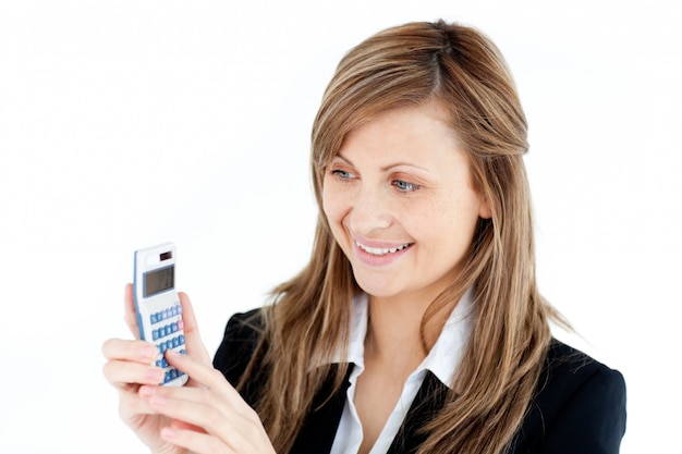 Charming businesswoman holding a calculator