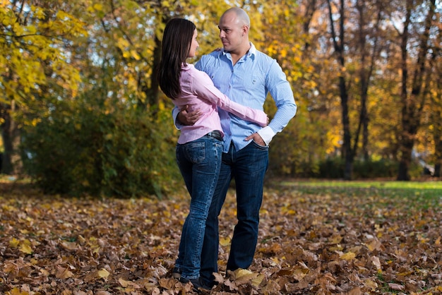 Charming Couple Standing Together At The Park