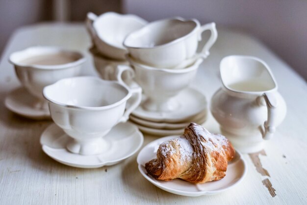 Charming French Breakfast white set and croissants