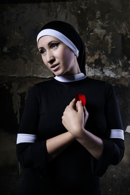 a charming nun in a dark basement secretly dreams of bright love