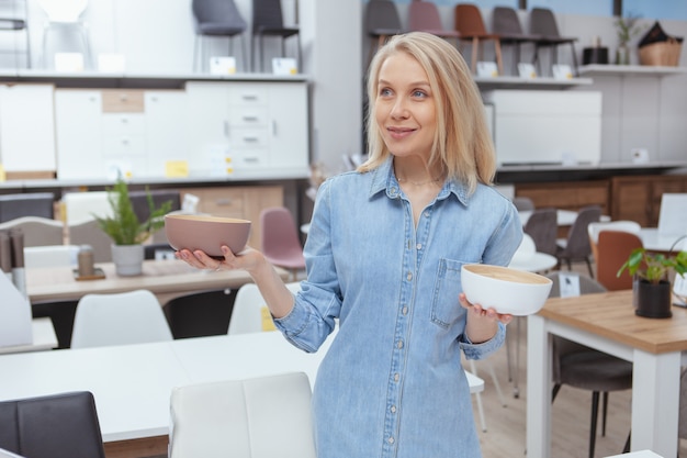 Charming woman shopping at furniture store