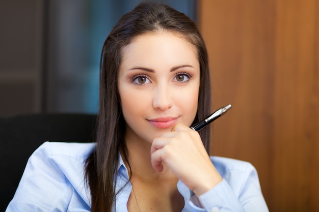 Charming young businesswoman portrait