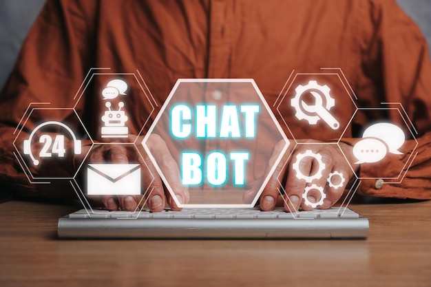 Chatbot assistant conversation Man hand typing on keyboard with chatbot icon on virtual screen robot application and global connection AI Artificial intelligence innovation and technology