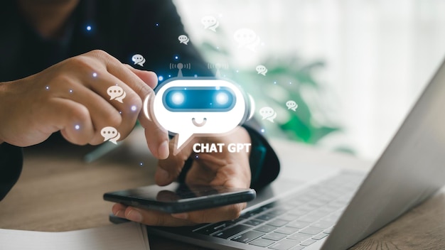 ChatGPT Chat with AI or Artificial Intelligence man chatting with a smart AI or artificial intelligence using an artificial intelligence chatbot developed by OpenAI