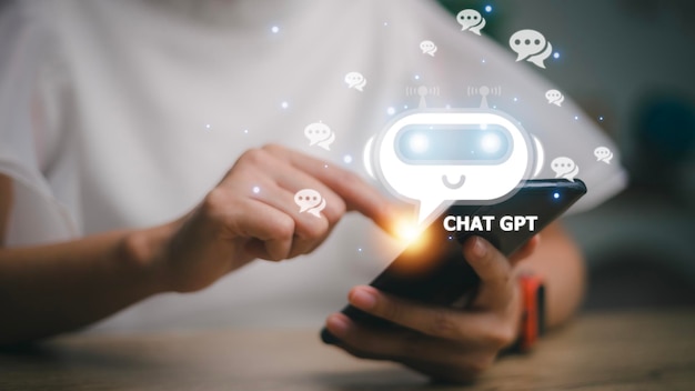 Chatgpt chat with ai or artificial intelligence woman chatting\
with a smart ai or artificial intelligence using an artificial\
intelligence chatbot developed by openai