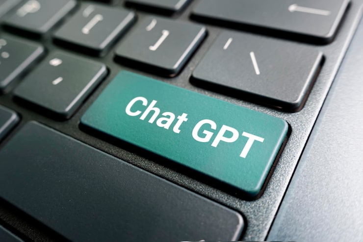 Photo chatgpt on keyboard button for chat with ai or artificial intelligence smart ai or artificial intelligence using an artificial intelligence chatbot developed by openai new neural network