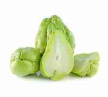 Photo chayote squash and a half on white background