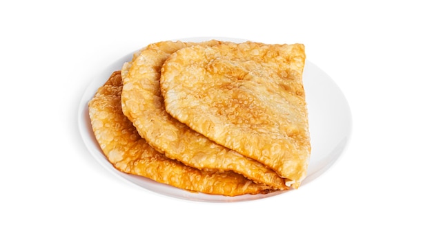 Chebureks are isolated on a white background