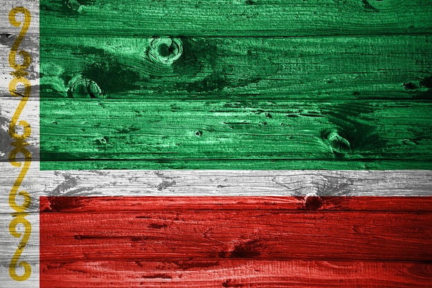 Chechnya flag on wooden planks background wood flag