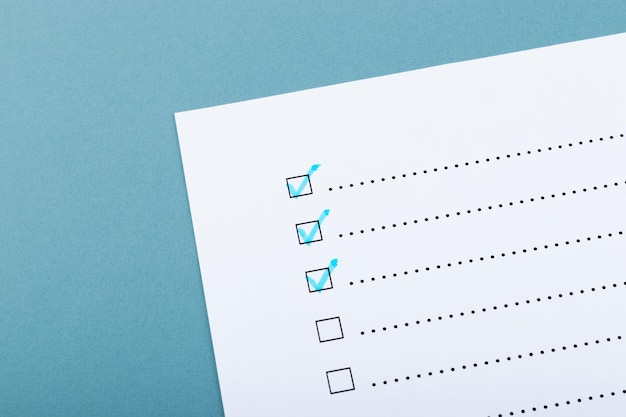 check list with blue marked points on blue background