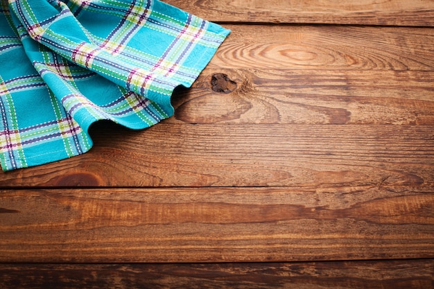 Checkered napkin on a wooden table