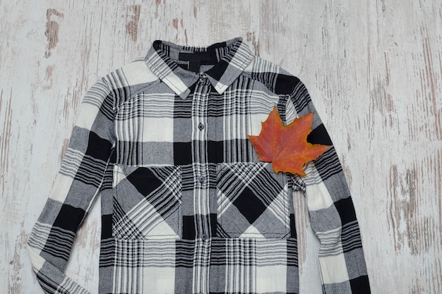 Checkered shirt and maple leaves