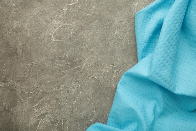 The checkered tablecloth on grey background decorative blue\
cotton napkin