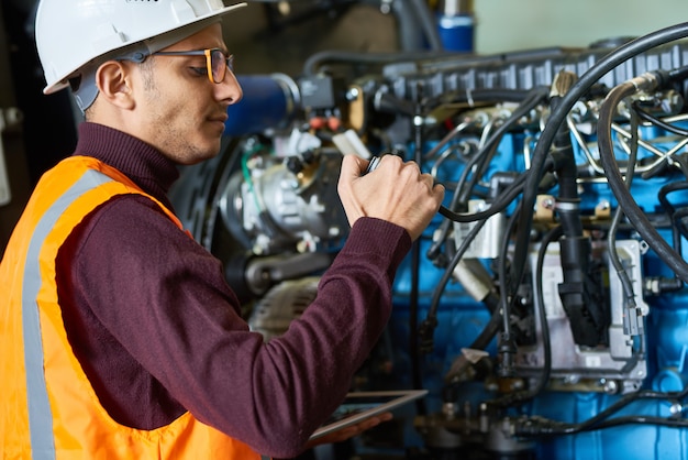 Checking Heavy Equipment at Modern Plant