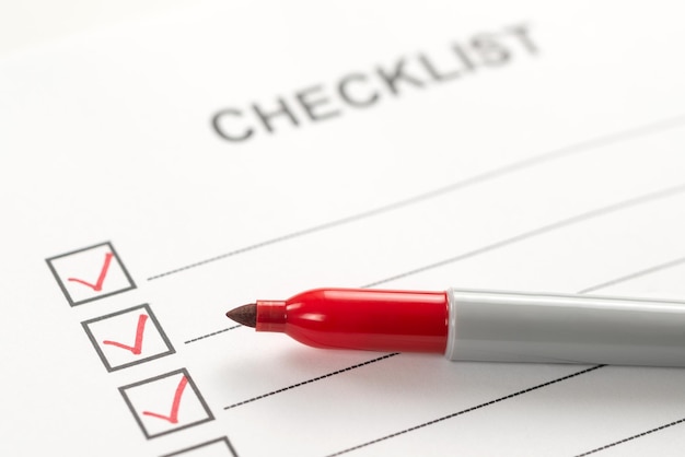 Checklist box with red marker pen