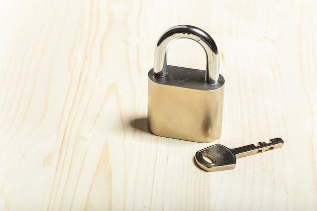 Checklock on the wooden table background