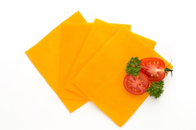 Cheddar cheese slice isolated on the white background.