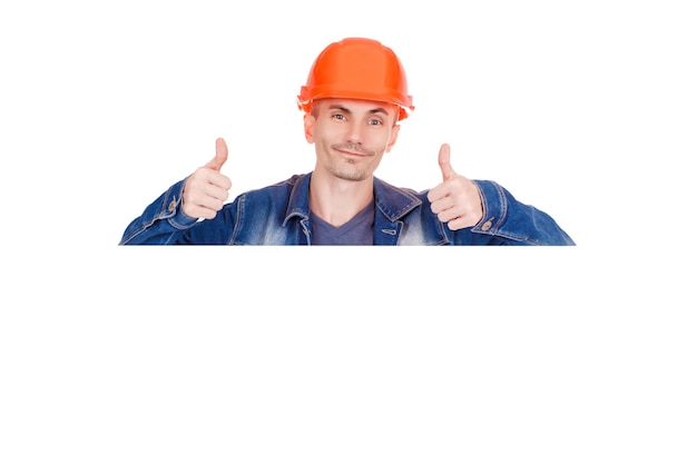 Cheerfu male industrial engineer in uniform Safety equipment Space for text