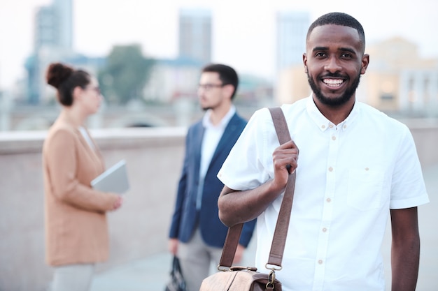 Cheerful Afro-American student guy