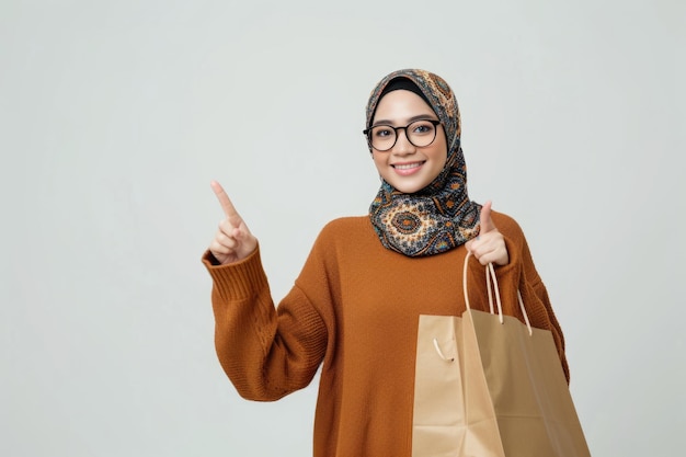 Cheerful Asian Muslim woman promoting Consumer Rights Day