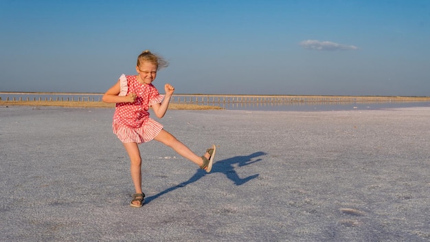 Cheerful in a beautiful dress with a charismatic appearance day and summer