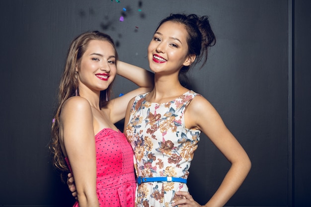 Cheerful beautiful young women having party