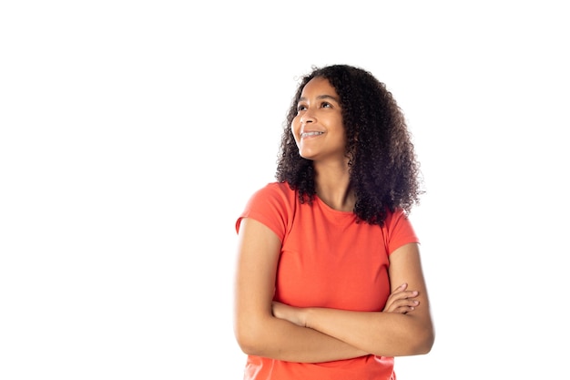 Cheerful black female student with afro hair isolated on a white background