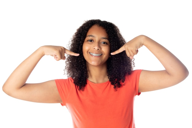 Cheerful black female student with afro hair isolated on a white background