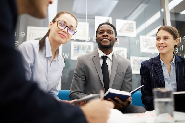 Cheerful Business People in Meeting