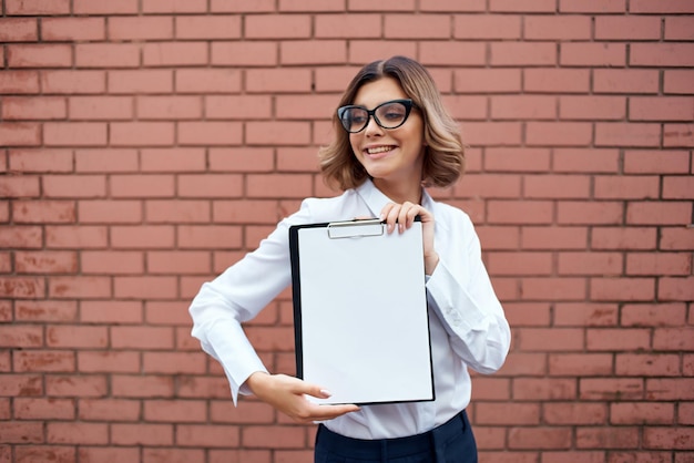 Cheerful business woman folder manager High quality photo