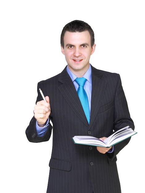 Cheerful  businessman with organizer and pen. Isolated  over white