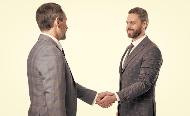 cheerful businessmen dealing isolated on white background businessmen dealing in studio businessmen dealing with handshake two businessmen dealing partnership