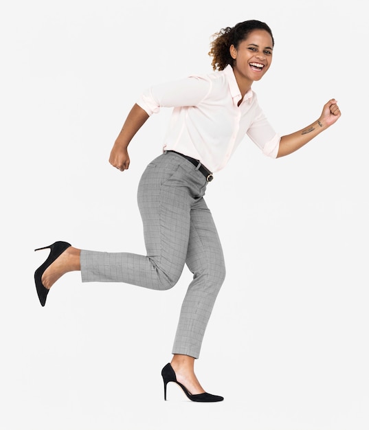 Cheerful businesswoman running towards success