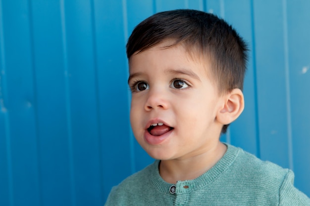 Cheerful child with two years on the street