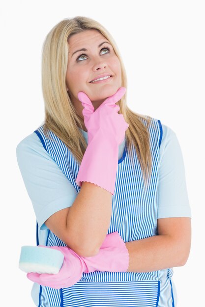 Cheerful cleaner thinking